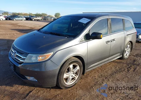 2012 Honda Odyssey Touring/Touring Elite z USA, uszkodzony, nr VIN 5FNRL5H9XCB021619